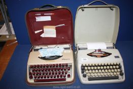 Two cased typewriters 'Tippa' and 'West German Olympia'.
