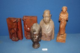 A quantity of Treen carved African figures and animal bookends.