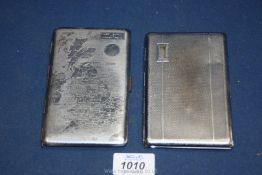 Two cigarette cases, one being foreign made with engraving of the U.K.
