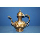 A heavy Indian brass Ewer with unusual faceted body 11" tall.