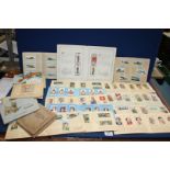 A box of cigarette cards in albums, themes to include cricketers, dogs, RAF badges etc.