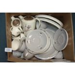 A Royal Doulton part dinner service in 'Frost Pine' pattern, dinner and side plates, soup bowls,