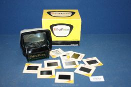 A boxed Halina Viewer with slides and instructions.