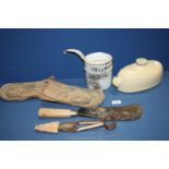 A Quaker Oats ladle, stoneware bed warmer and hedging gloves and tools.