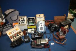 A box of camera miscellanea to include Kodak, Akita, Halina cameras, Corfield Lumimeter,