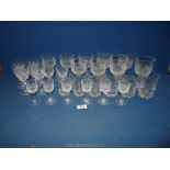 A quantity of cut glass including Thomas Webb red and white wine and liqueur glasses,
