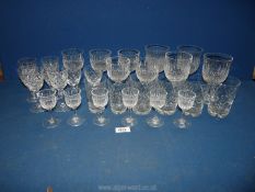 A quantity of cut glass including Thomas Webb red and white wine and liqueur glasses,