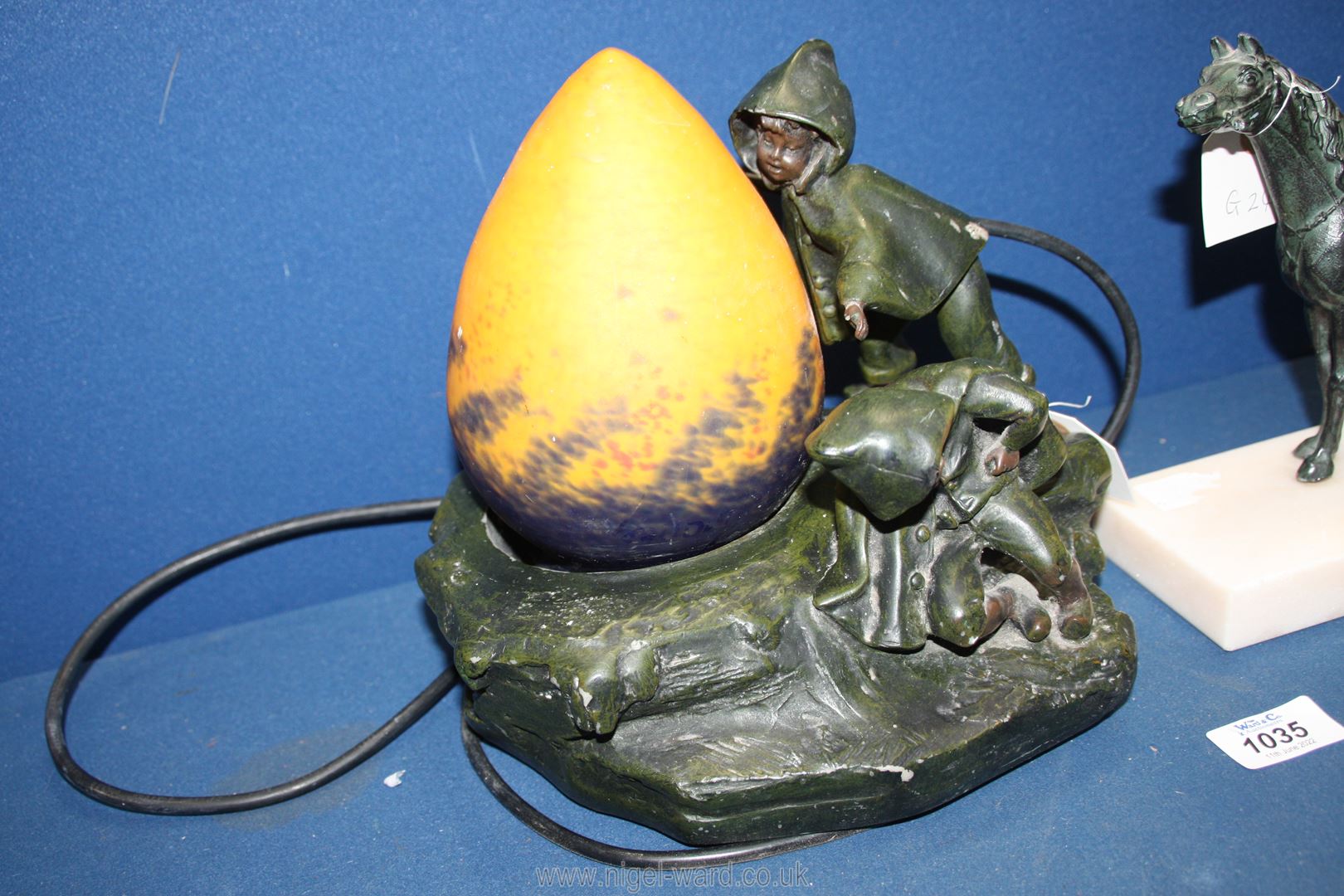 An Auguste Moreau style lamp with orange egg shaped shade featuring children playing on a rock, - Image 2 of 2