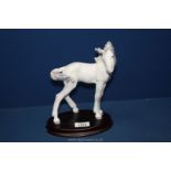 a Lladro Zodiac Collection Foal with grey and white coat and flowers in the mane, dated 2001.