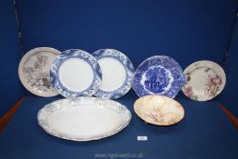 A quantity of plates including a large meat plate, Poole plate, two Adderleys blue and white plates,