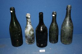 Five early 19th c. wine/brandy bottles, one by G.A. Jourde Bordeaux, with deep pontils.