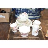 A very pretty bone china part Teaset marked with entwined initials C and F to base and pattern no