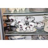 A Royal Albert 'Masquerade' Teaset, complete six setting plus six matching mugs and saucers,