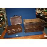 A wooden crate for The Hill Top Fruit Farm, Ledbury and two small suitcases.