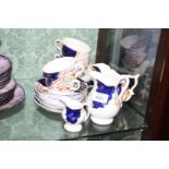 A small quantity of Gaudy Welsh china in Tulip design: four cups and saucers,