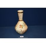 A Royal Worcester blush ivory bottle Vase with twist fluted body and banded gilt neck with all-over