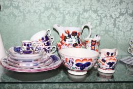 A quantity of Gaudy Welsh china in Oyster design: two cake plates, three cups,