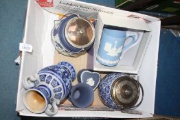 A quantity of blue and white china including four pieces of Wedgwood Jasperware, boxed tankard,