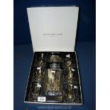 A boxed set of Royal Doulton decanter and whisky glasses.