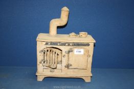 A model stove titled 'Albion Lamp Co. Ltd. Birmingham' 13" x 10" x 5".