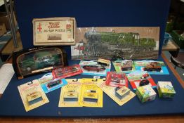 A quantity of model vehicles, mostly boxed, jigsaws (missing pieces) boxed Del Prado soldiers,