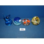 Four paperweights including blue, white and green swirl, Sweden Konst glass, blue fox,