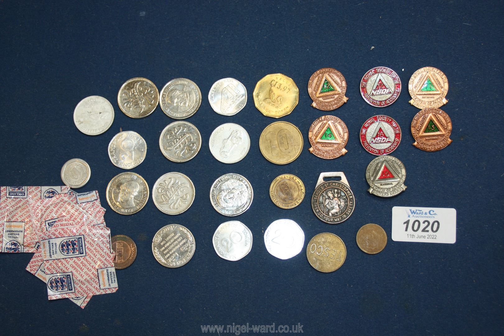 A quantity of tokens, six Makers of The Millennium coins, Prevention of Accidents badges etc.