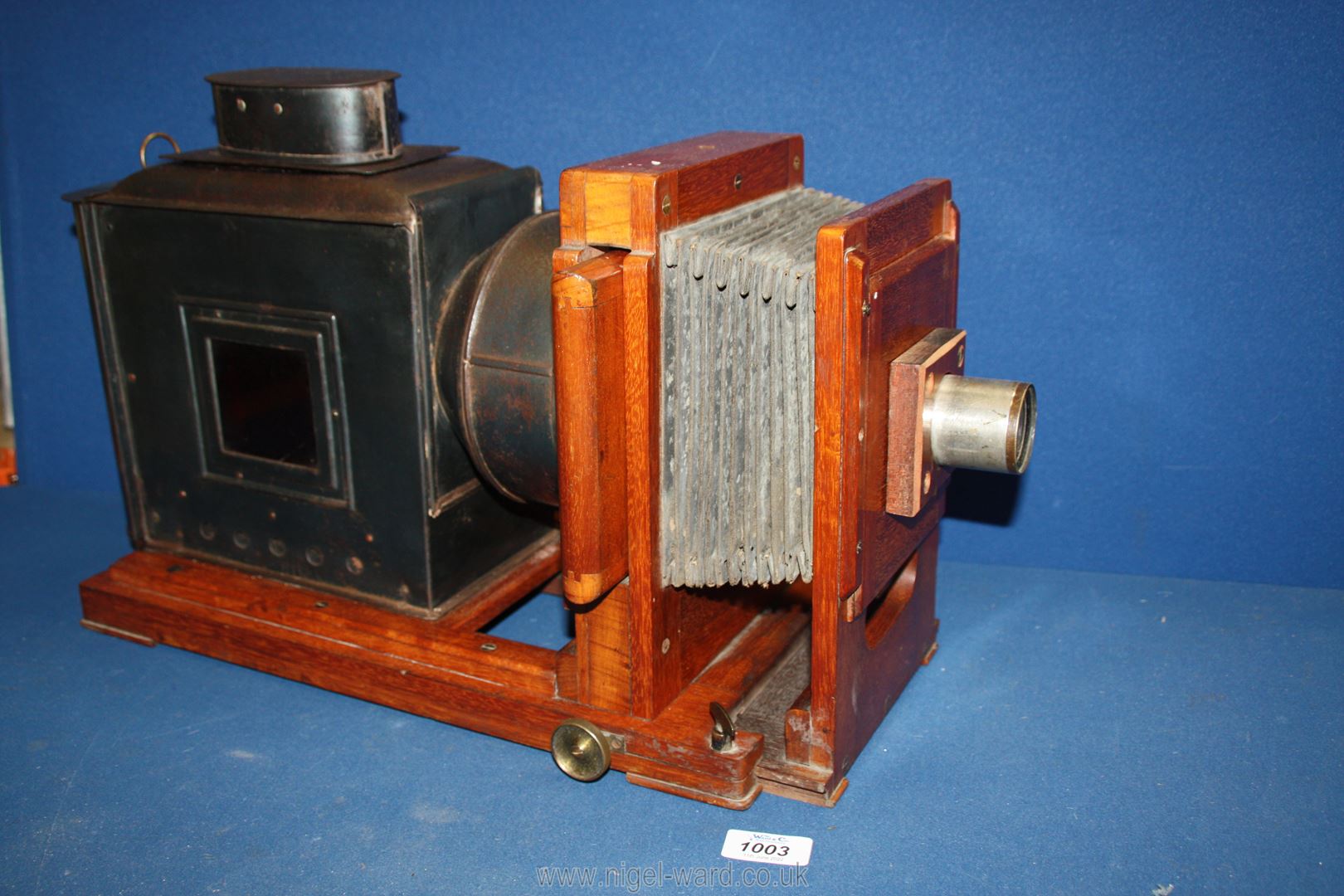 An Edwardian extending Magic Lantern Projector 24" long x 9" wide x 11" tall.