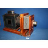 An Edwardian extending Magic Lantern Projector 24" long x 9" wide x 11" tall.