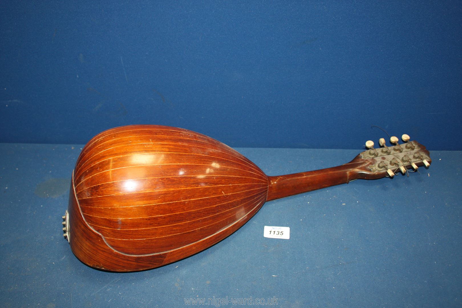 An old mandolin with butterfly shaped inlay (a/f) and Mother of pearl detail, some damage, - Image 2 of 3
