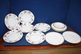 A quantity of Wedgwood dinner plates including six each of 'Chinese Flowers' and 'Gold Ulander',