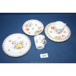 Two Dresden trios, hand painted with flowers in vivid multi-colours,