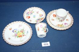 Two Dresden trios, hand painted with flowers in vivid multi-colours,