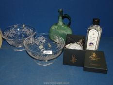 Two glass trifle bowls with vine leaf decoration,