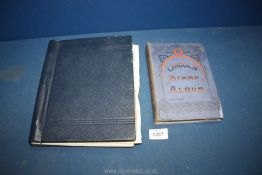 Two old stamp books with miscellaneous foreign and English stamps one album being the Lincoln stamp
