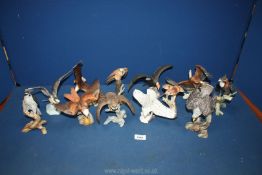 Twelve small bird of prey figures, Malaysian made in 1988, one a/f.