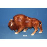 A Melbaware style Buffalo figure, (slight crazing and chip to foot), approx.