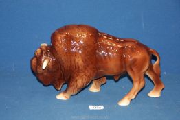 A Melbaware style Buffalo figure, (slight crazing and chip to foot), approx.