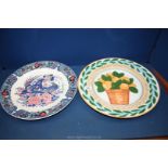 A large Villeroy & Boch Gallo design Charger with hand painted oranges in a basket and vivid
