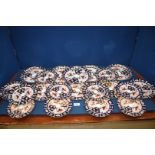 A quantity of Royal Crown Derby (mostly seconds) Imari pattern breakfast, side and tea plates.