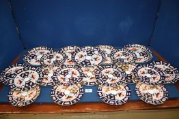 A quantity of Royal Crown Derby (mostly seconds) Imari pattern breakfast, side and tea plates.