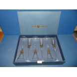 A boxed set of six 'Funktion' Champagne flutes in Laguna design with yellow glass diamond shapes to
