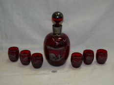 A ruby glass Venetian liqueur decanter and six glasses,