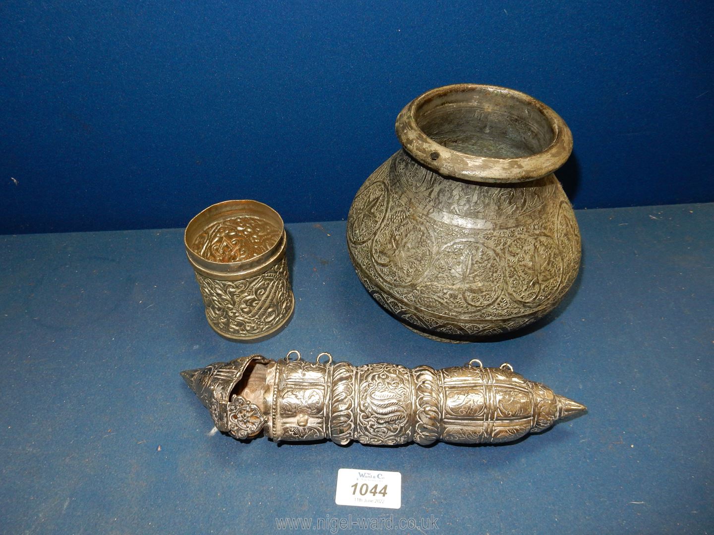 Three pieces of Indian metalware including small pot.