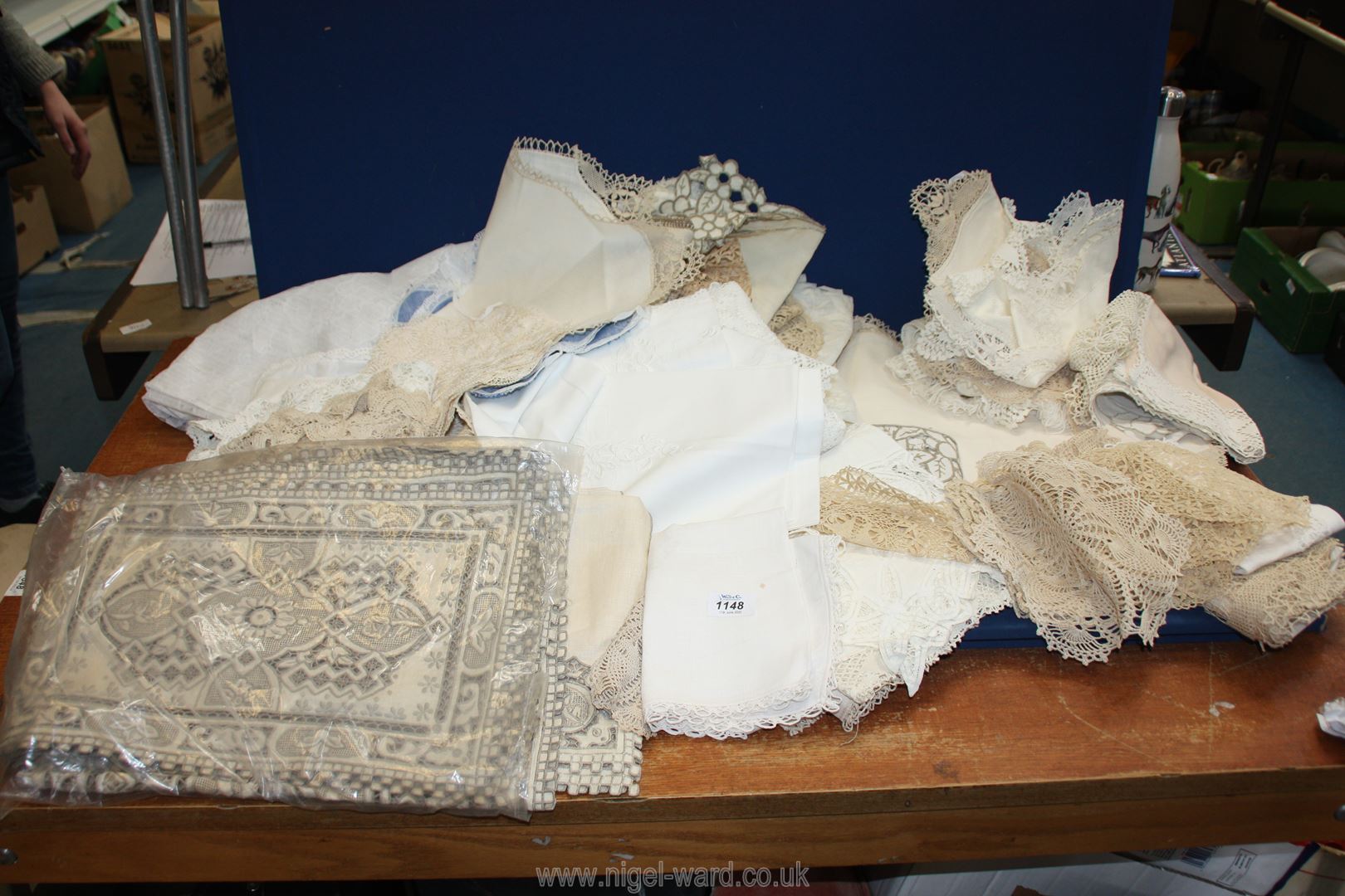 A quantity of linen, lace, crochet, table ware etc.