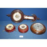 Four small aneroid Barometers.