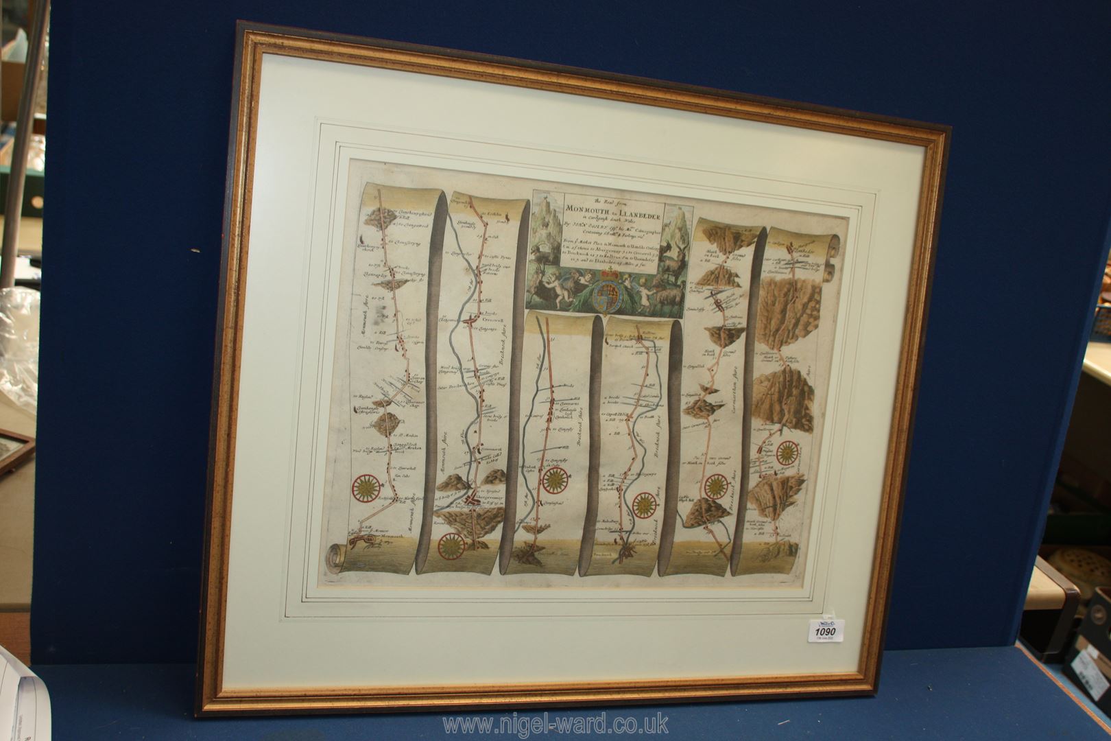 A framed map by John Ogilby of 'The Road from Monmouth to Llanbeder',