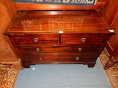 A low Mahogany Chest of two long and two short Drawers with drop ring handles,