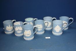 Eight Wedgwood Jasperware mugs to include two 1975 Christmas mugs,