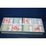 Two boxes of Cath Kidson mugs in well known Cath Kidson patterns; pink rose, blue polka dot,